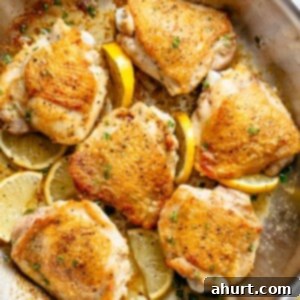 Golden Lemon Chicken 8 Roast Lemon Chicken thighs with crispy skin pan, seared then oven baked for tender and juicy chicken full of flavour in a pan