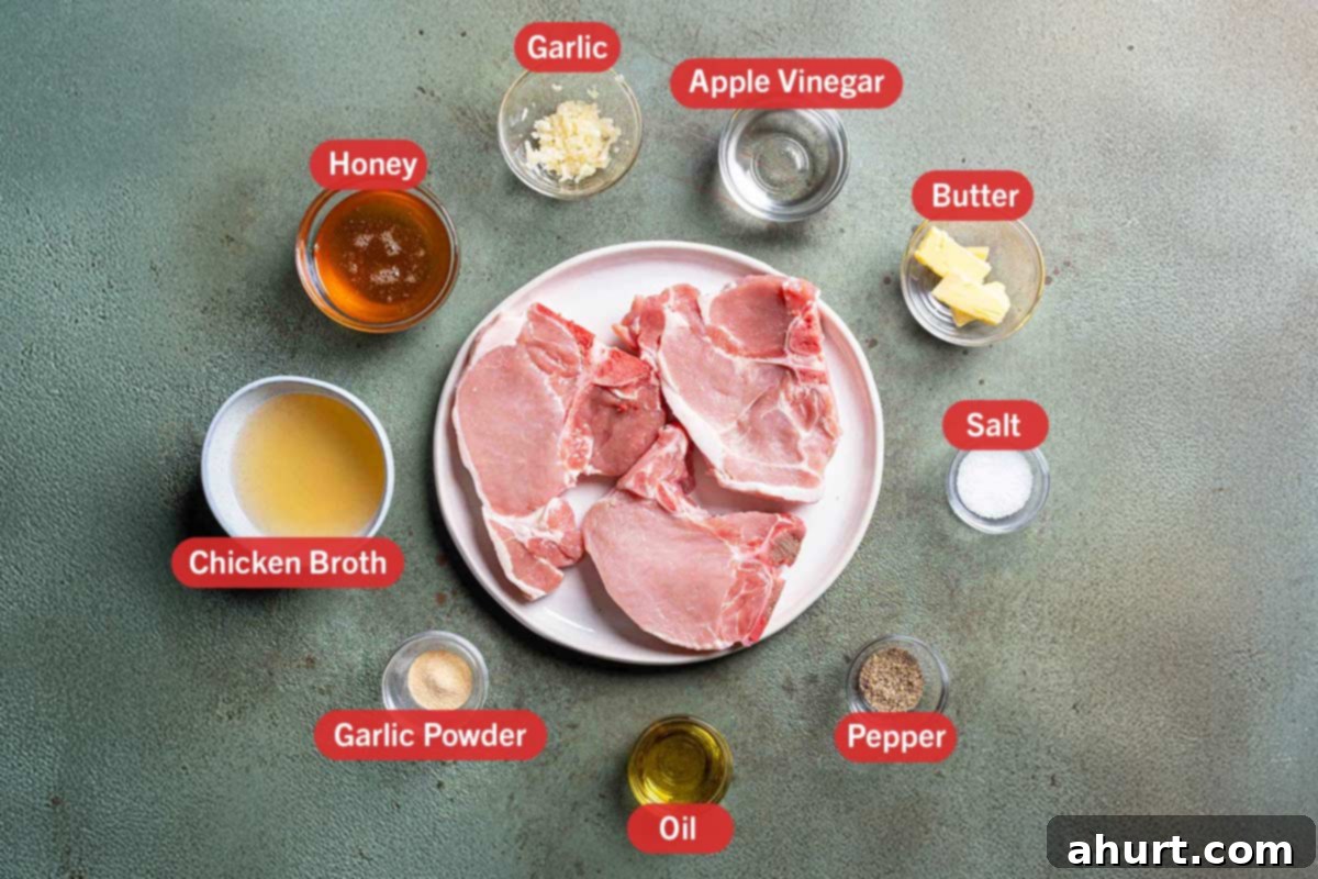 Quick Beef Noodle Stir-fry 3 Ingredients laid out on a green background in white bowls: honey, garlic, apple cider vinegar, butter, salt, pepper, oil, garlic powder, chicken broth and pork chops.