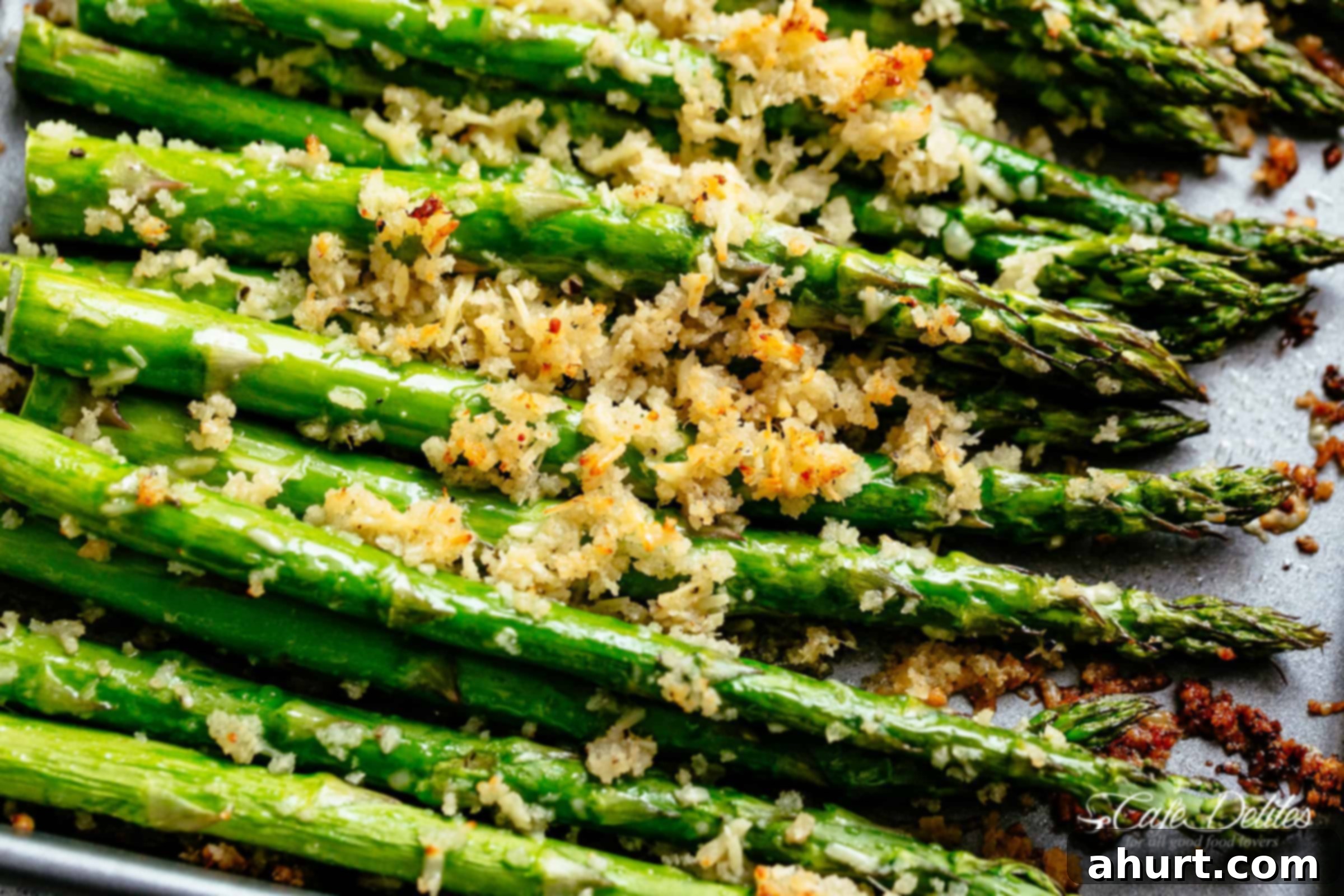 Crispy Garlic Parmesan Asparagus | cafedelites.com Close-up view of perfectly roasted Crispy Garlic Parmesan Asparagus with golden brown crust.