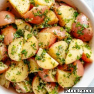 Zesty Garlic Herb Red Potato Salad 2 Garlicky Herb Red Potato Salad is ridiculously easy to make and packed with flavor in a bowl