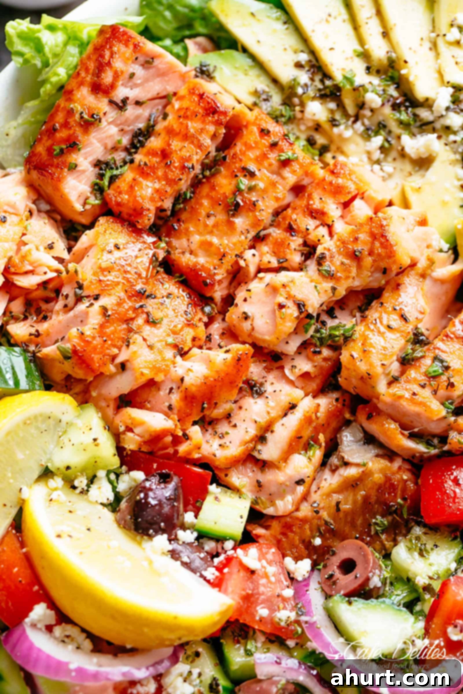 Salmon Salad | cafedelites.com Avocado Salmon Salad with an incredible lemon herb Mediterranean dressing! Loaded with cucumber, olives, tomatoes and feta cheese in a pan