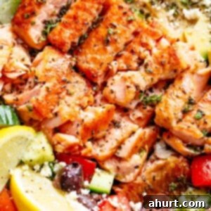 Sun-Drenched Mediterranean Salmon and Avocado Salad 2 Avocado Salmon Salad with an incredible lemon herb Mediterranean dressing! Loaded with cucumber, olives, tomatoes and feta cheese in a pan