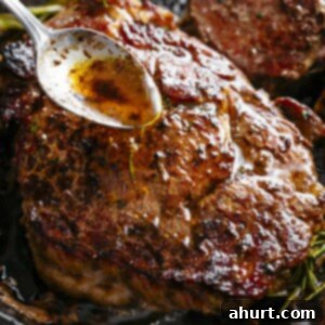 The Steakhouse Masterpiece 4 Butter garlic mixture being poured on Basted Steak