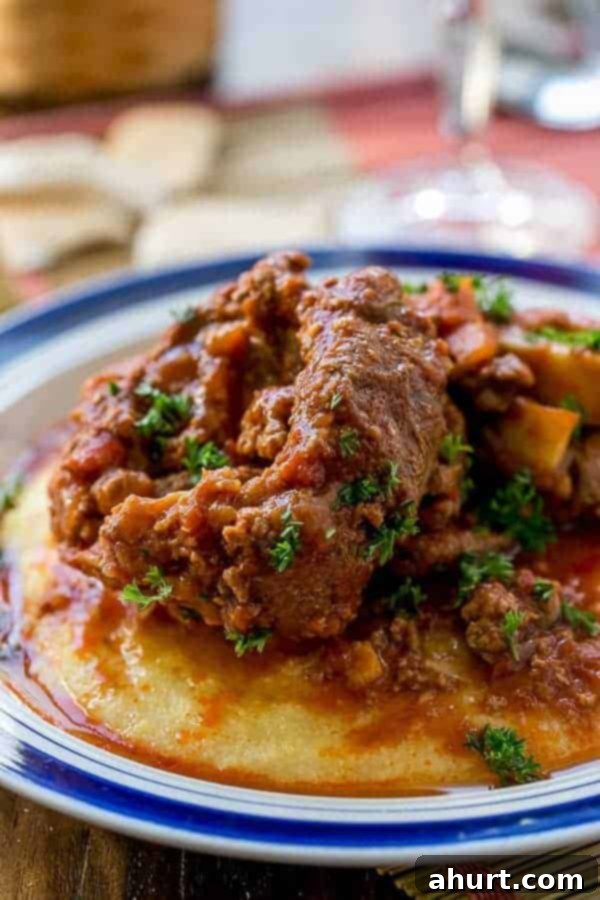 Osso Bucco in Red Wine Salsa with Soft Polenta on a plate