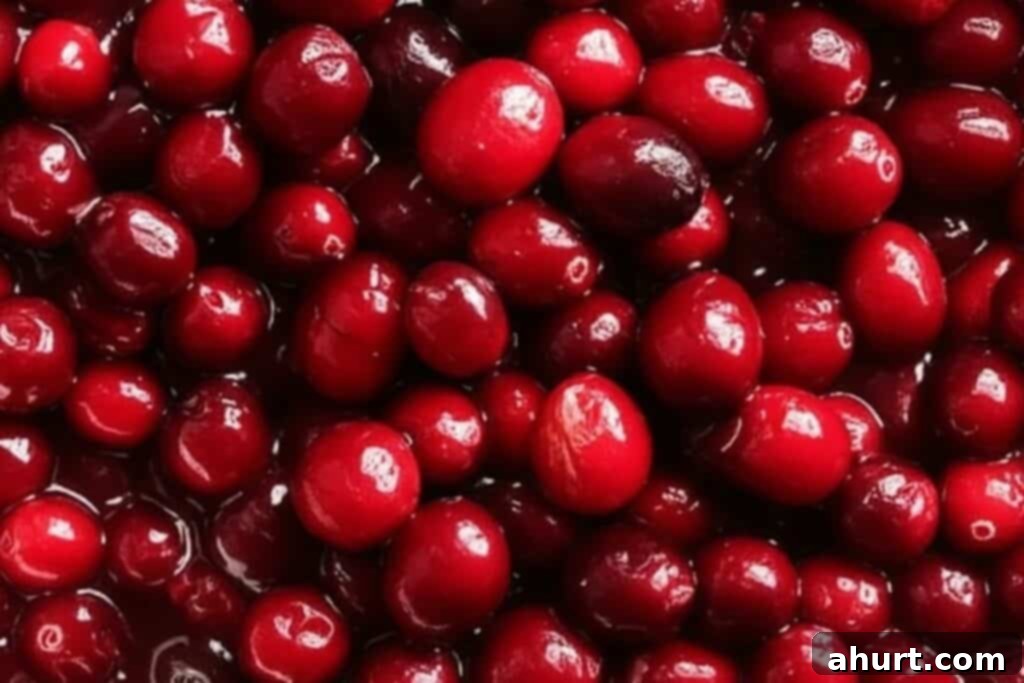 The Ultimate Cranberry Sauce 7 Adding reserved cranberries