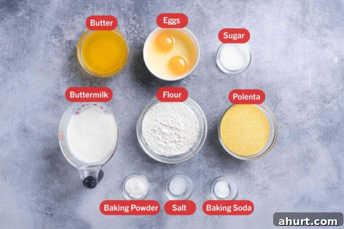 The Ultimate Recipe for Melt-in-Your-Mouth Cornbread 2 A picture of the ingredients needed for the cornbread recipe, specifically: butter, eggs, sugar, buttermilk, flour, polenta, baking powder, salt, and baking soda arranged neatly.