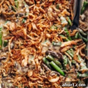 Velvety Green Bean Casserole with a Golden Crunch 13 Crunchy Green Bean Casserole with homemade cream of mushroom soup and French fried onions!