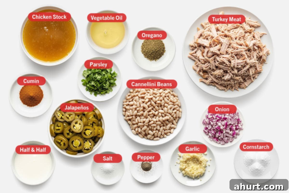 Hearty White Turkey Chili 2 Top shot of ingredients: Chicken stock, vegetable oil, oregano, turkey meat, cumin, parsley, cannellini beans, onion, milk, Jalapeños, salt, pepper, garlic, and cornstarch.