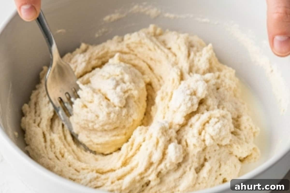 Fluffy Bacon Cheddar Delights 8 Stir in the chilled buttermilk with a fork until just combined, forming a shaggy dough.