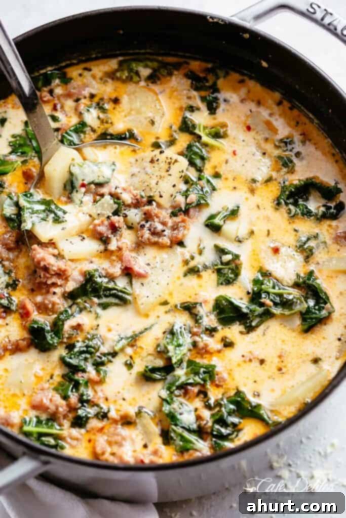 Creamy Tuscan Sausage and Potato Soup 2 Creamy Zuppa Toscana full of crumbled sausage, crispy bacon and tender potatoes in a creamy broth!