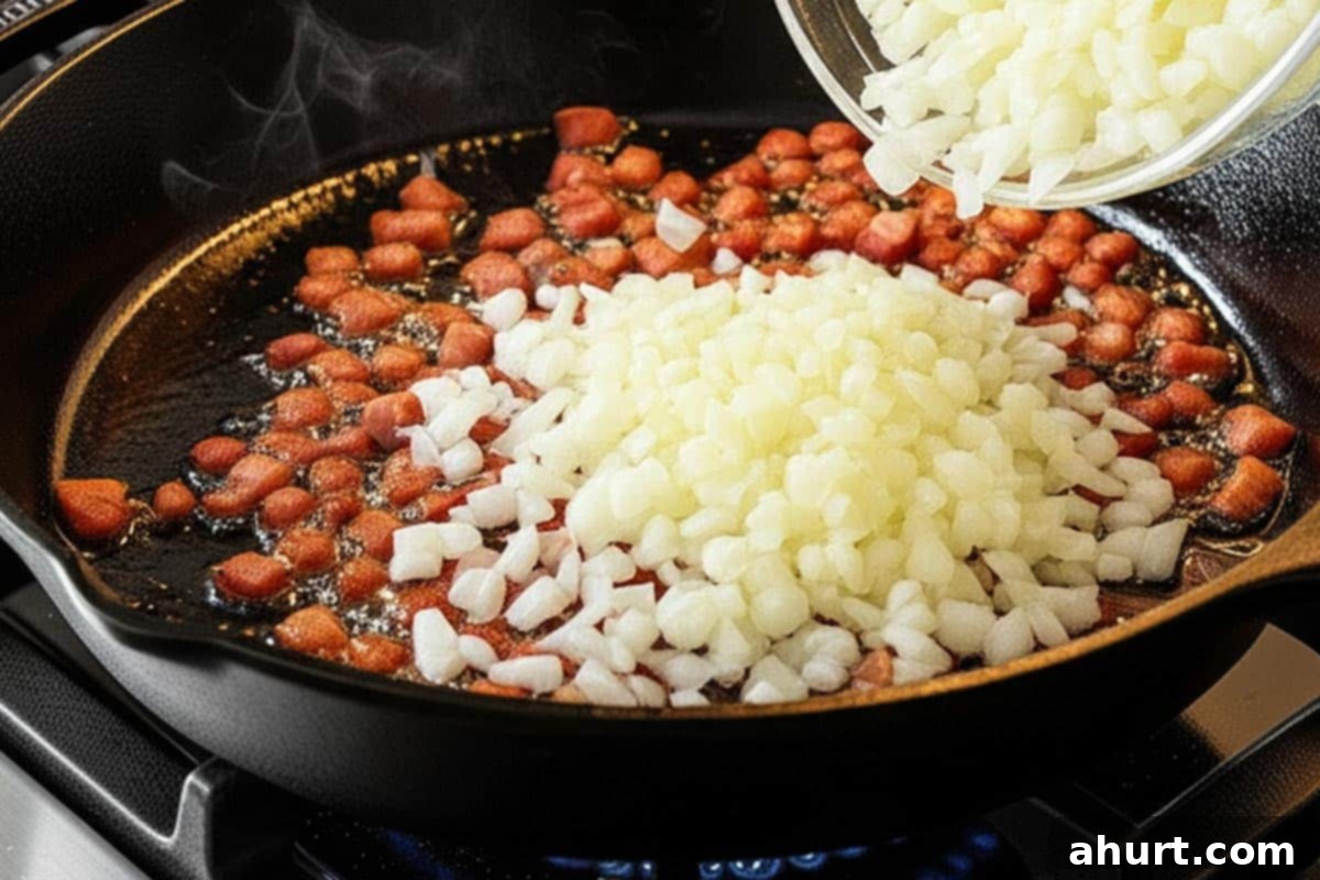Savory Morning Casserole: Bacon or Sausage Bliss 5 Diced onion poured in the skillet with bacon.