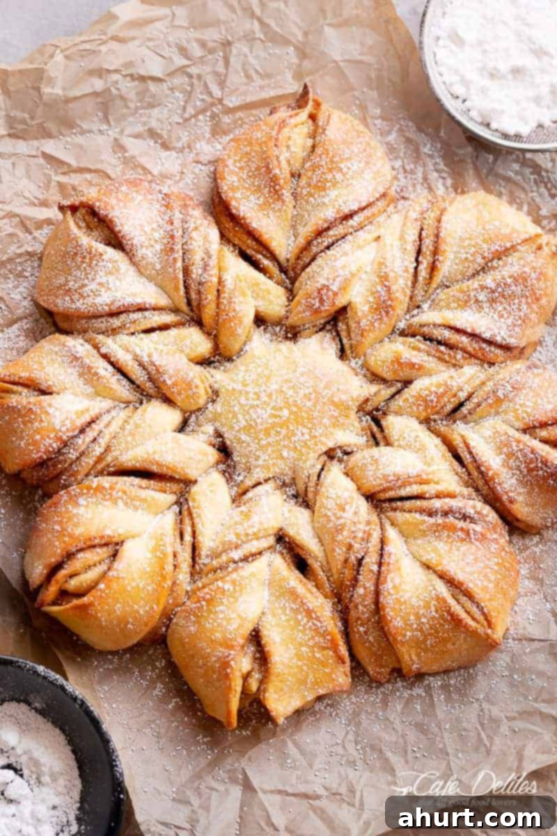 Starry Cinnamon Pull-Apart 2 Star Christmas Bread coated with powdered sugar, ready to be served during holidays