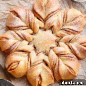 Starry Cinnamon Pull-Apart 4 Top view of Star Christmas Bread, beautifully shaped and dusted with powdered sugar