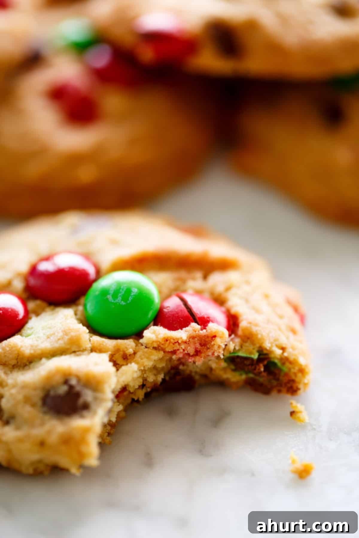 A bite taken from M&M Cookies (Soft Santa Cookies)