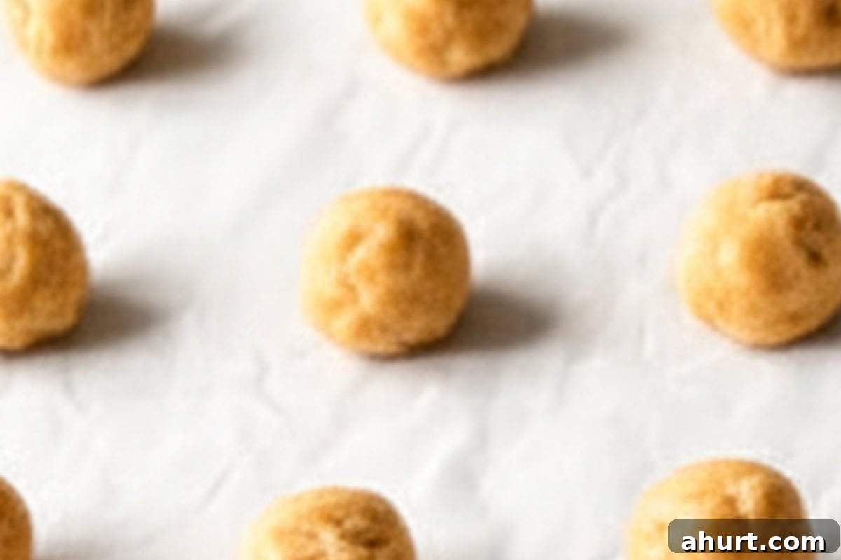 Frosted Nutty Bites 10 Scoop 1 tablespoon portion of the dough and roll into balls and place 1 inch apart on the baking sheet.
