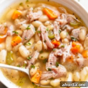 Smoky Ham and White Bean Chowder 9 Ham Bean Soup in a bowl