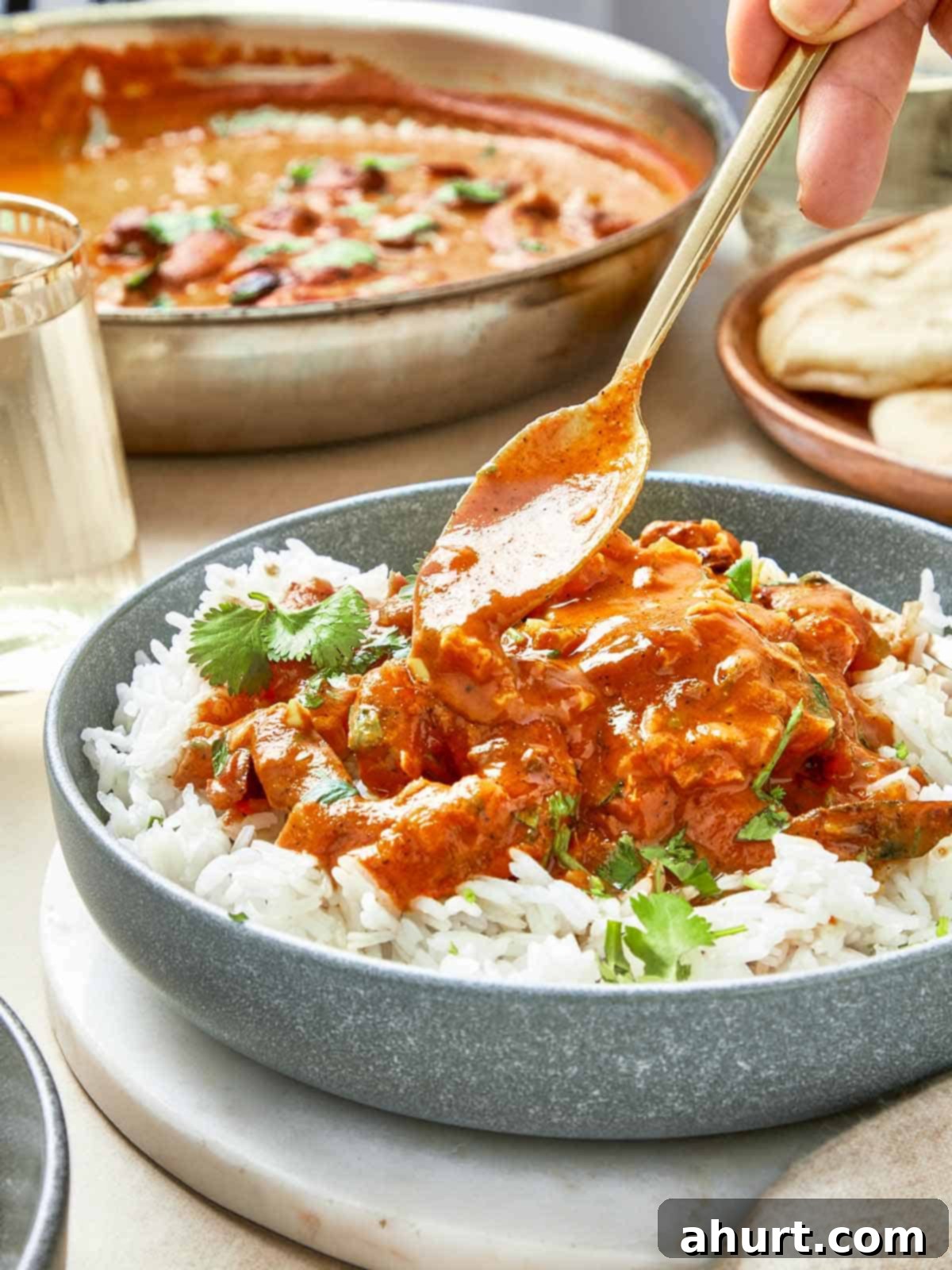 Easy Creamy Coconut Shrimp Curry 2 Coconut Shrimp with a bowl of sauce