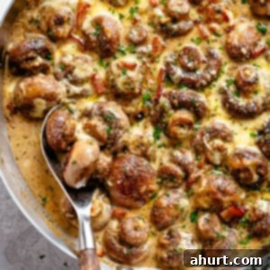 Creamy Garlic Mushrooms 11 Creamy Garlic Mushrooms and Bacon in a pan