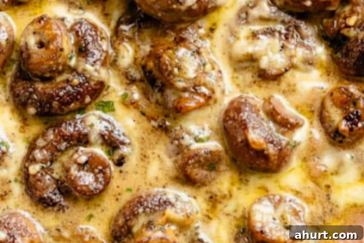 Creamy Garlic Mushrooms 7 Add in the garlic and cream and the chopped herbs. Gently simmer for 4-5 minutes until the sauce thickens.