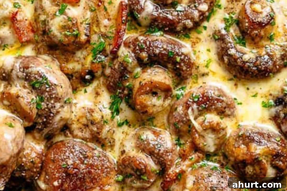 Creamy Garlic Mushrooms 9 Add the cooked bacon into the pan and top with mozzarella and parmesan.
