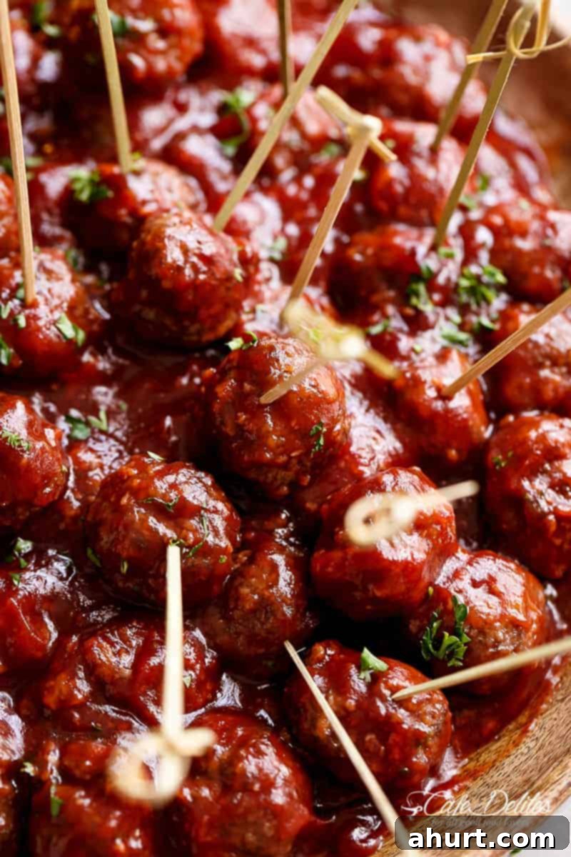 Cocktail Meatballs Appetizer #cafedelites #appetizers #cocktail #meatballs Cocktail Meatballs in Sweet and Sour Sauce pierced with toothpick for easy access