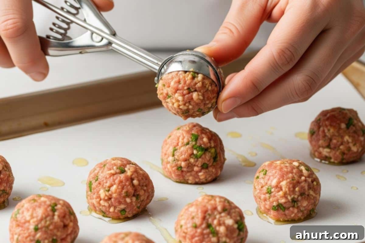Tangy Glazed Party Meatballs 5 Formed meatballs using small cookie scoop.