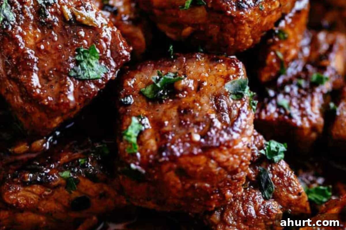 Irresistible Cajun Butter Steak Bites 9 Super close, steak bites with oregano sprinkled