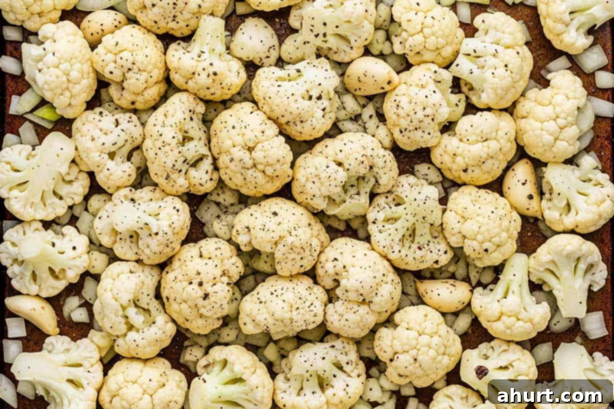 Creamy Cauliflower Comfort 3 Cauliflower, onion, and garlic, seasoned with salt and pepper.