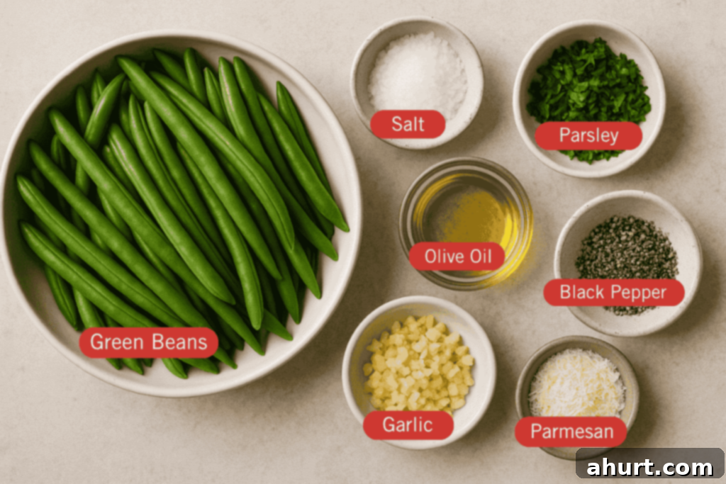 Parmesan Garlic Green Beans 2 A labeled flatlay image showing individual bowls of ingredients for garlic green beans on a light surface. The ingredients include fresh green beans in a large bowl, and smaller bowls of salt, chopped parsley, olive oil, black pepper, finely chopped garlic, and grated parmesan cheese.