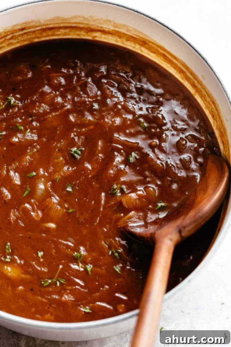 Classic French Onion Soup is one of the most delicious soups in the world! Caramelized onions create a stock filled with an intense depth of flavor. Simmered with fresh herbs, optional white wine and finished off with garlic bread slices topped with two types of melted cheese.