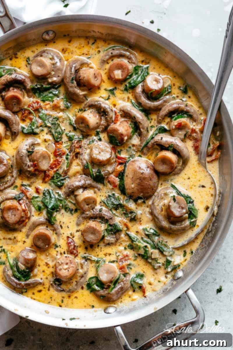 Velvety Garlic Butter Mushrooms 2 Creamy Garlic Butter Tuscan Mushrooms in a steel container