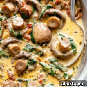 Velvety Garlic Butter Mushrooms 13 Creamy Garlic Butter Tuscan Mushrooms with spoon