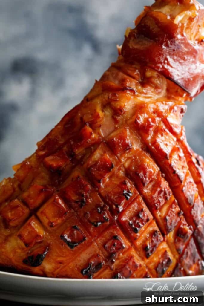 Caramelized Maple Ham 2 Baked Maple Glazed Ham, beautifully glazed with a golden-brown, sticky crust and ready for serving as a holiday centerpiece.