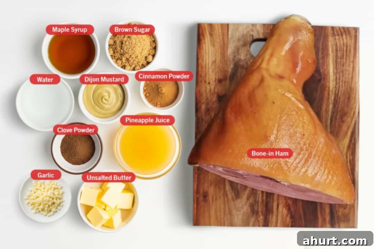 Caramelized Maple Ham 3 Top shot of all the ingredients needed for a Maple Glazed Ham: bone-in ham, maple syrup, brown sugar, water, Dijon mustard, cinnamon powder, clove powder, pineapple juice, garlic, and unsalted butter arranged on a white surface.