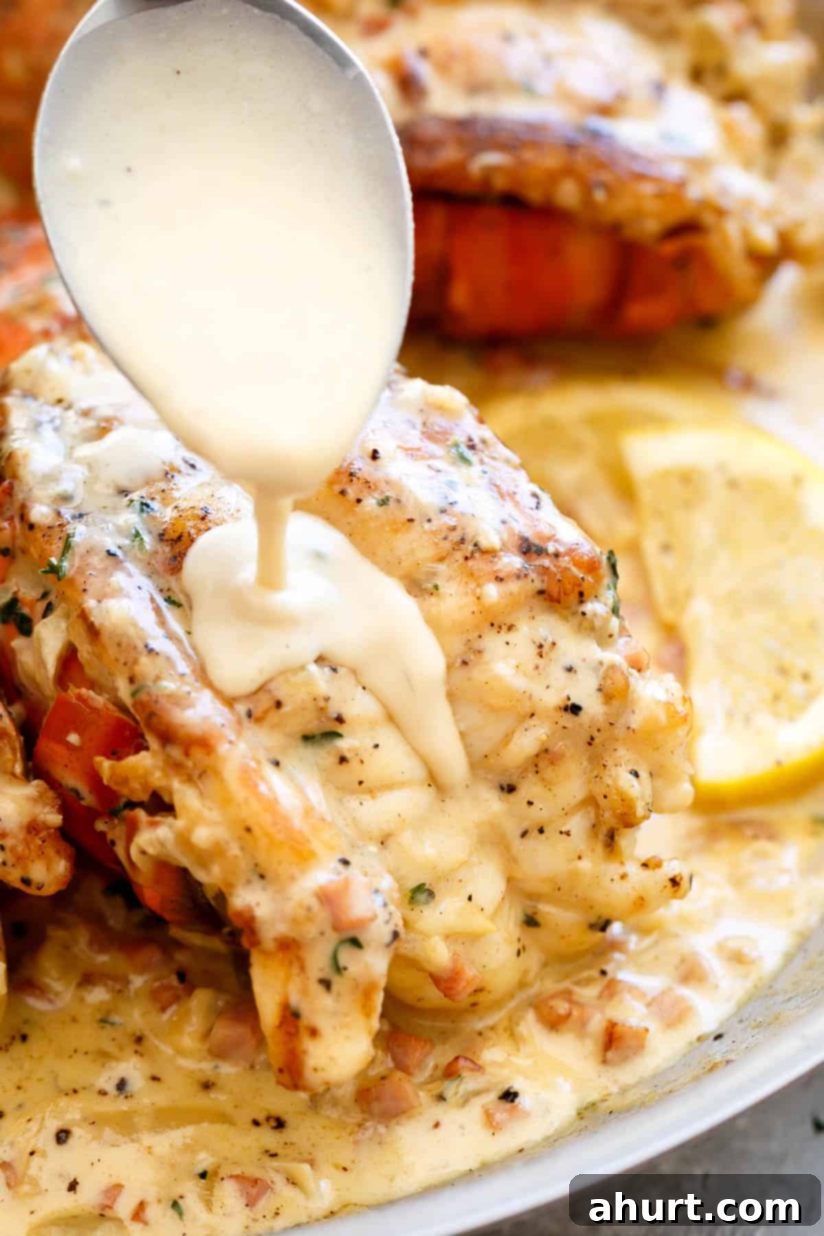 Pan seared lobster tails #lobstertails creamy garlic sauce poured on Lobster tails