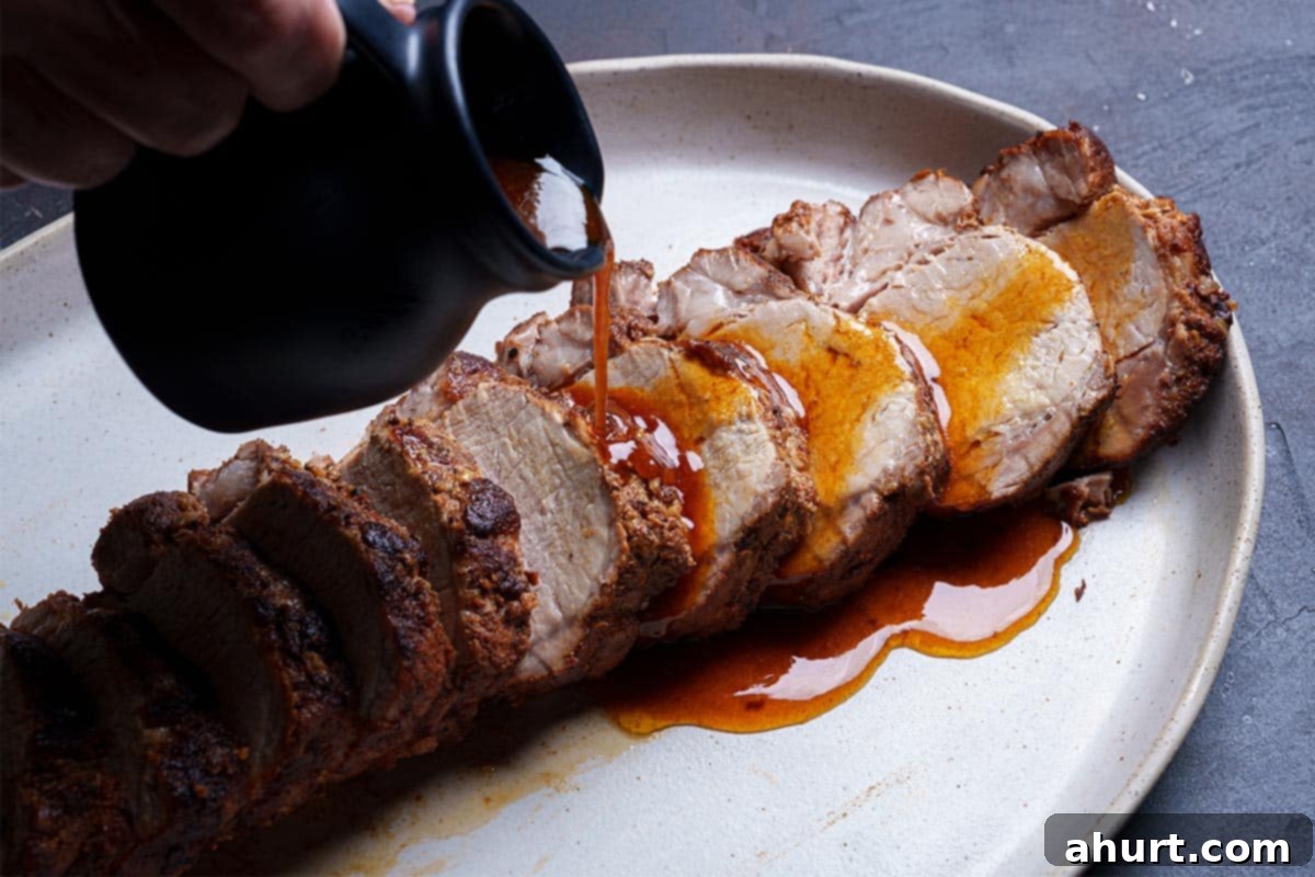 Tender & Juicy Oven-Roasted Pork Loin 10 Slices of roast pork loin generously drizzled with thickened honey garlic butter sauce.