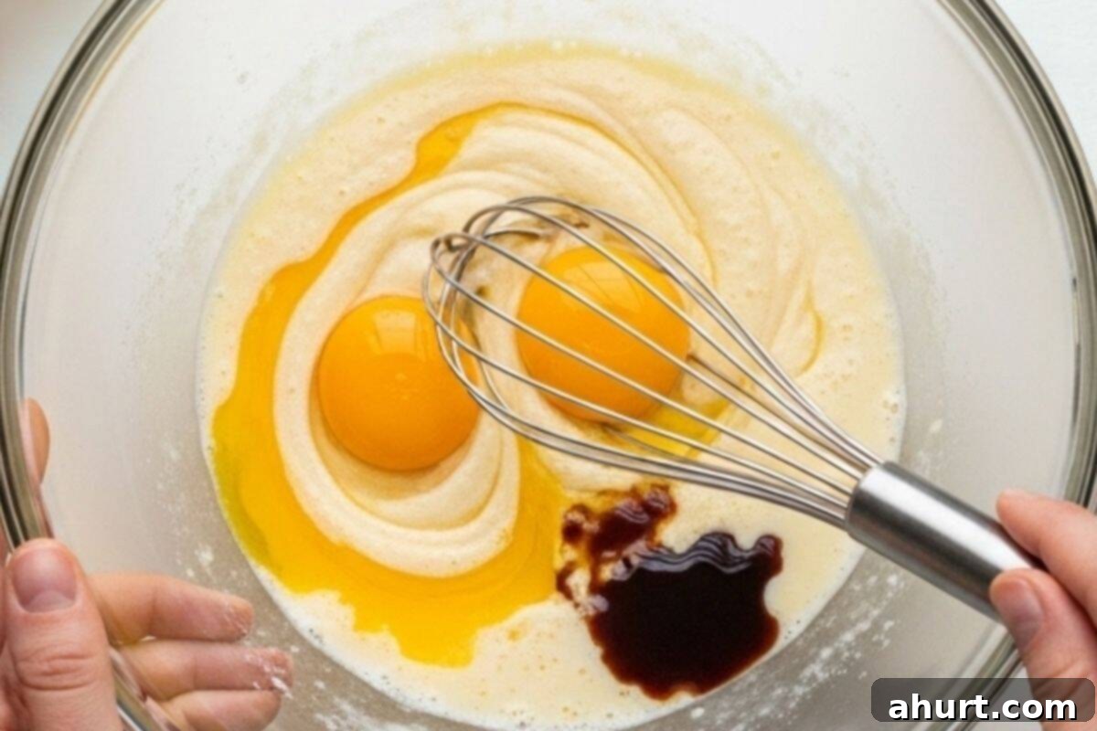 Perfect Homemade Belgian Waffles 7 whisk egg yolks with oil, mil and vanilla extract until smooth
