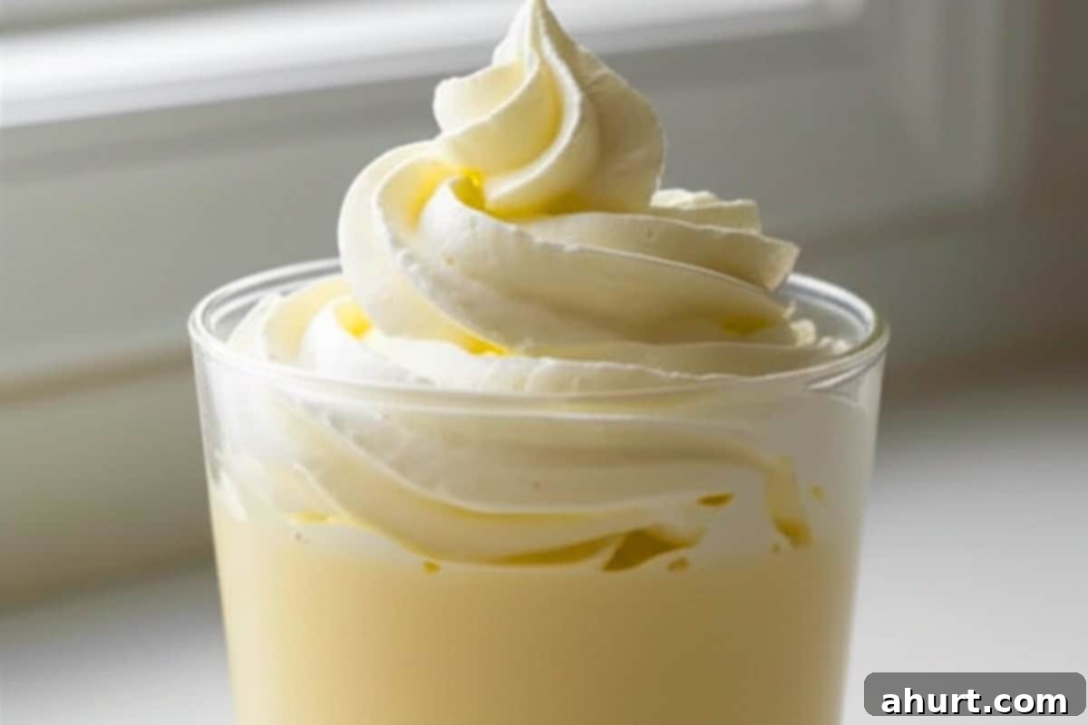 Best Creamy Eggnog Recipe 8 top the eggnog with whipped cream and freshly grated nutmeg
