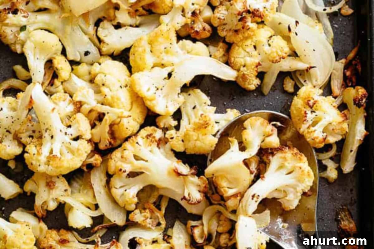 Roasted Cauliflower 8 Close-up shot of perfectly golden brown and fork-tender roasted cauliflower ready to be served.