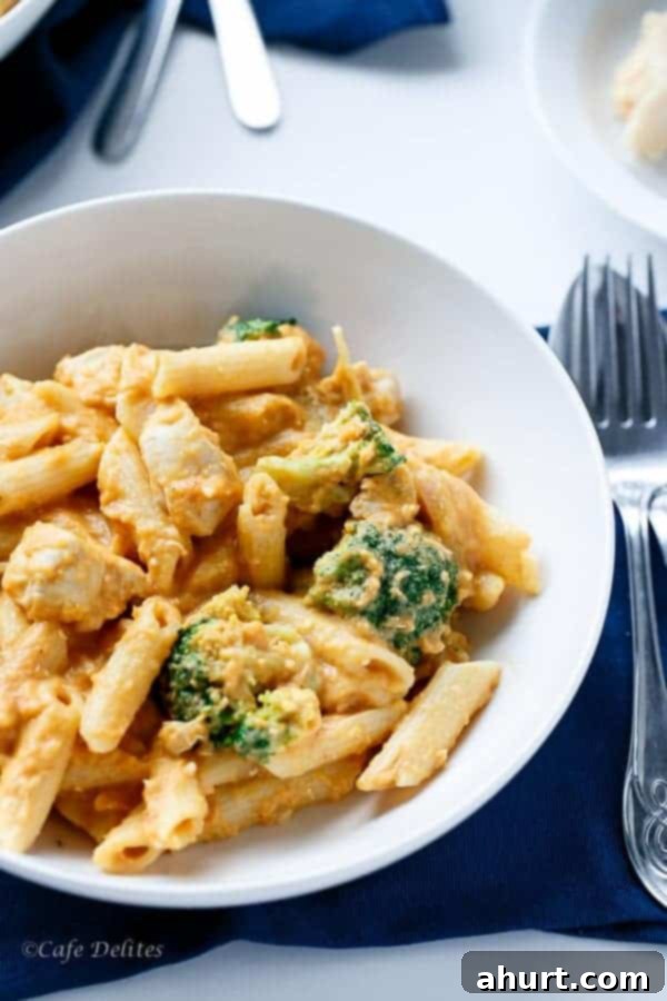 Velvety Pumpkin Chicken Alfredo with Broccoli 7 Top side view image of Creamy Pumpkin Chicken and Broccoli Pumpkin Alfredo, highlighting the rich texture