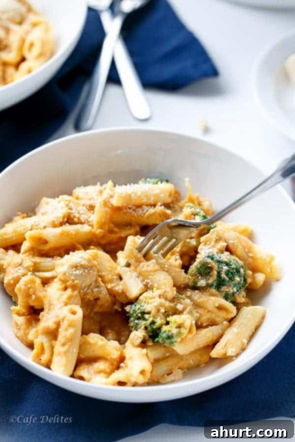 Velvety Pumpkin Chicken Alfredo with Broccoli 9 Creamy Pumpkin Chicken and Broccoli Alfredo in a bowl, showcasing vibrant colors