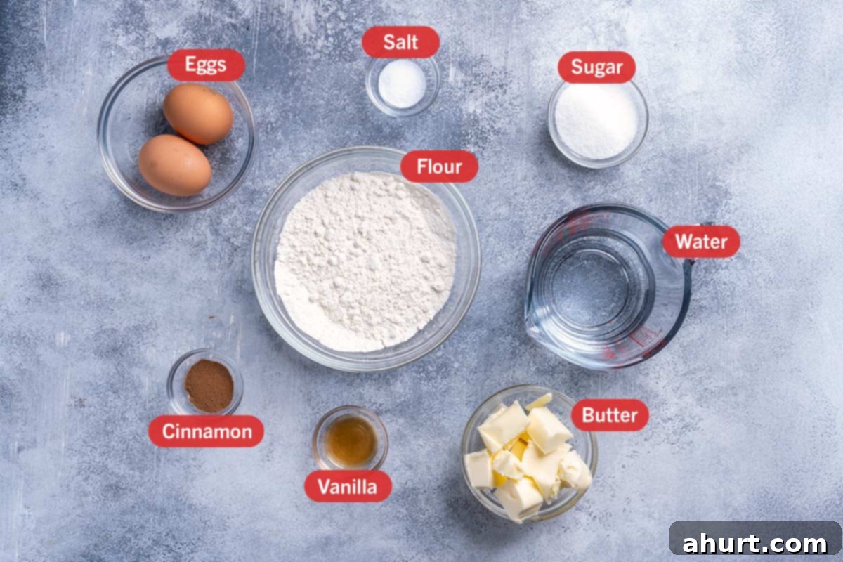 The Ultimate Churros Recipe 3 Image of the ingredients needed for the preparation of churros, specifically: flour, water, sugar, eggs, cinammon, vanilla, butter.