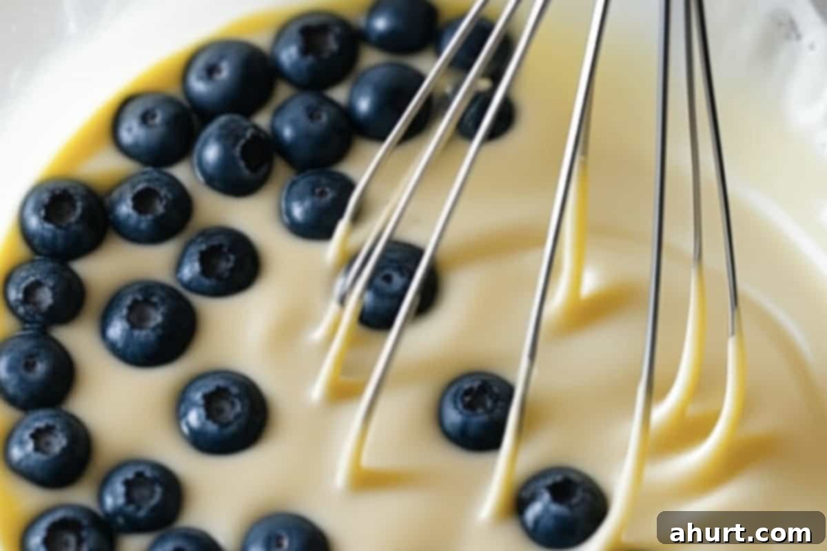 Morning Blueberry Bliss 5 Add the fresh or frozen blueberries to the pancake batter, folding them in gently to avoid bruising or streaking.