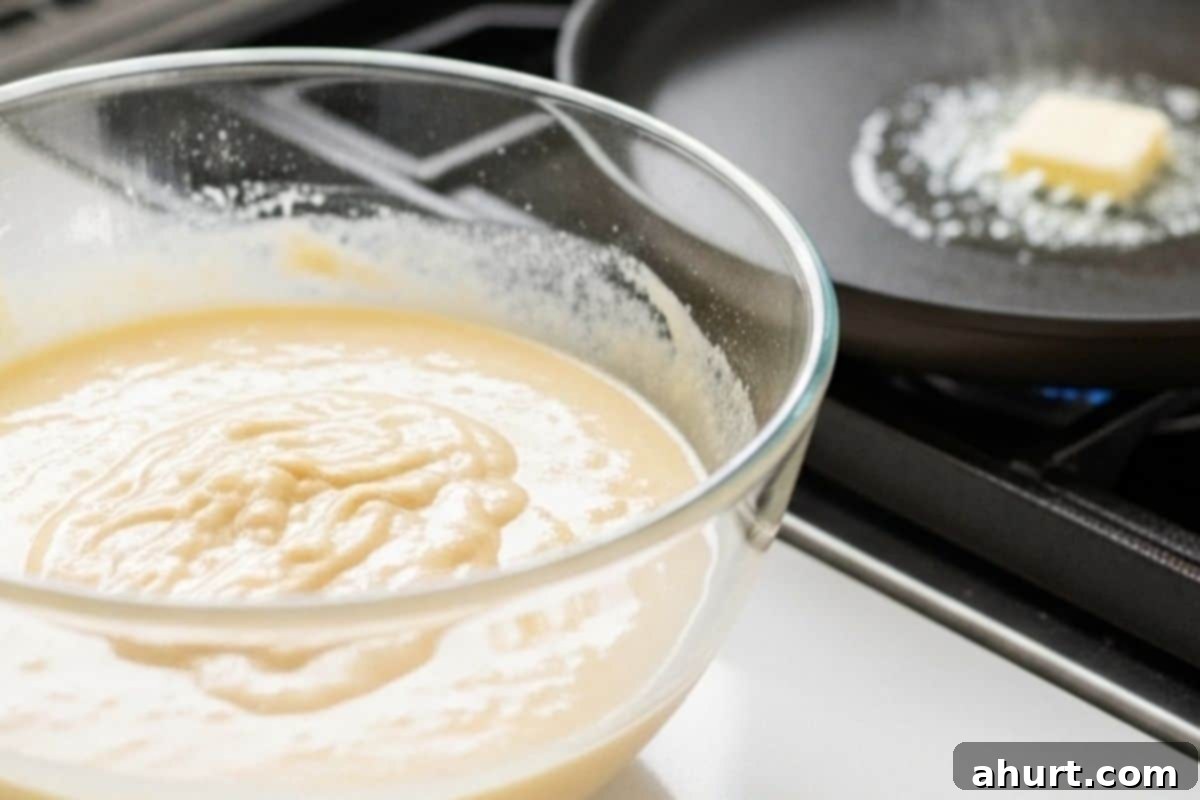 Morning Blueberry Bliss 6 Allow the blueberry pancake batter to rest while lightly greasing and heating a nonstick pan or griddle over low-medium heat.