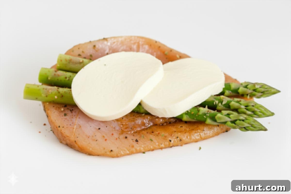 Savory Asparagus Stuffed Chicken Breasts 9 Chicken breast with asparagus and mozzarella cheese.