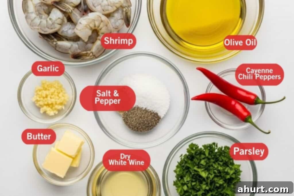 Perfect Garlic Butter Shrimp 3 A vibrant flat lay of fresh ingredients for Chili Garlic Butter Shrimp, including large raw shrimp, a stick of butter, fresh garlic cloves, bright red chili peppers, and a bunch of fresh parsley, all ready for cooking.