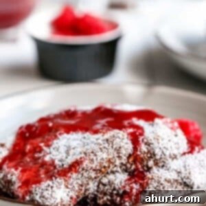 Lamington French Toast with Sweet Raspberry Drizzle 5 Lamington French Toast with Raspberry Jam Syrup in a bowl, ready to serve