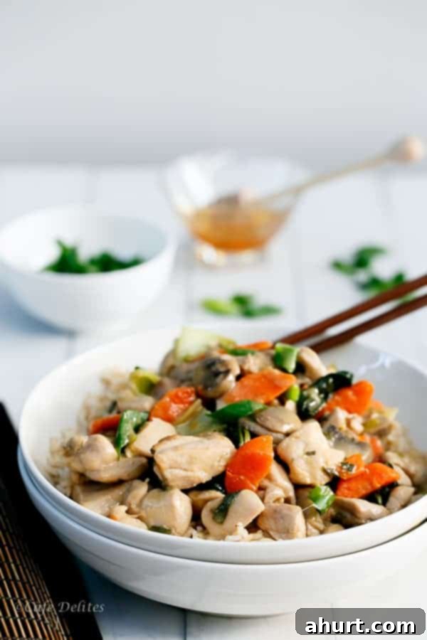 A bowl of Honey Mustard Chicken Stir Fry, showing the tender chicken, crisp vegetables, and rich sauce
