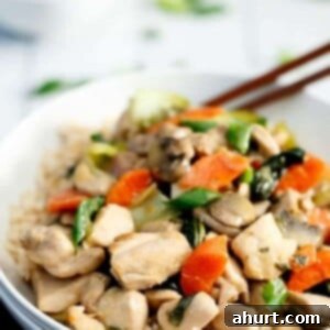 Glazed Honey Mustard Chicken Stir Fry 10 Honey Mustard Chicken Stir Fry in a bowl with chopsticks