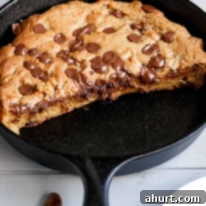 Decadent Nutella Cookie Pie 9 The best buttery and gooey Nutella stuffed deep dish chocolate chip skillet cookie